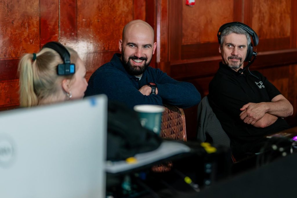 Event manager and technical team working at the event